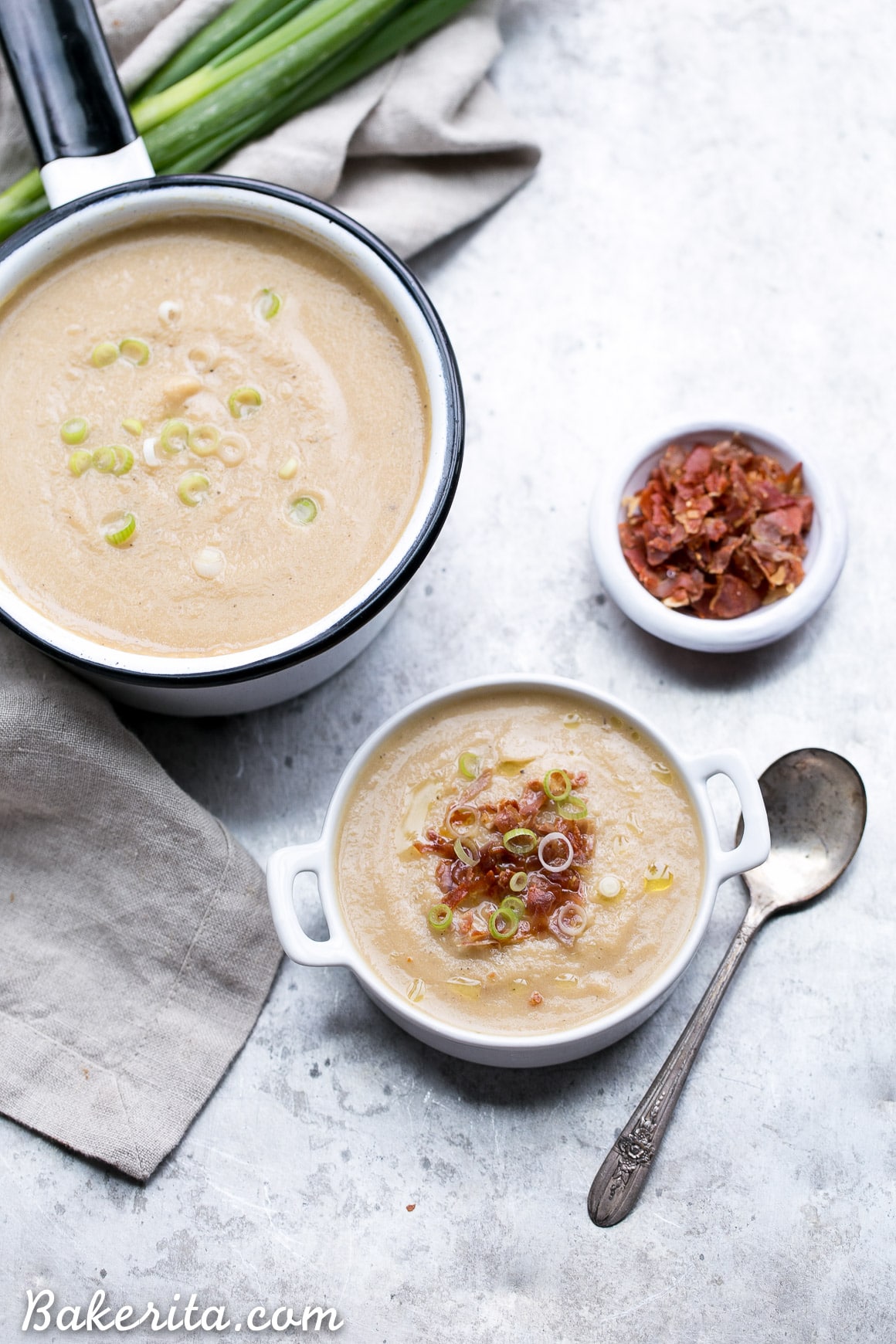This Cauliflower Leek Soup tastes just like potato leek soup - it's incredibly flavorful and super creamy without ANY dairy needed! Made in just 30 minutes, this Paleo + Whole30-approved soup will definitely warm you up and satisfy - it's also easily made vegan.