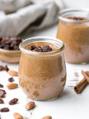 This homemade Cinnamon Raisin Almond Butter is smooth and creamy, with chewy bits of raisins in every spoonful! Spread it on apples, bananas, toast, or just enjoy it as is.