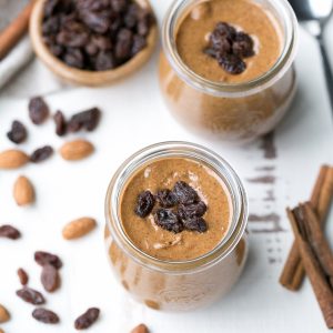 This homemade Cinnamon Raisin Almond Butter is smooth and creamy, with chewy bits of raisins in every spoonful! Spread it on apples, bananas, toast, or just enjoy it as is.