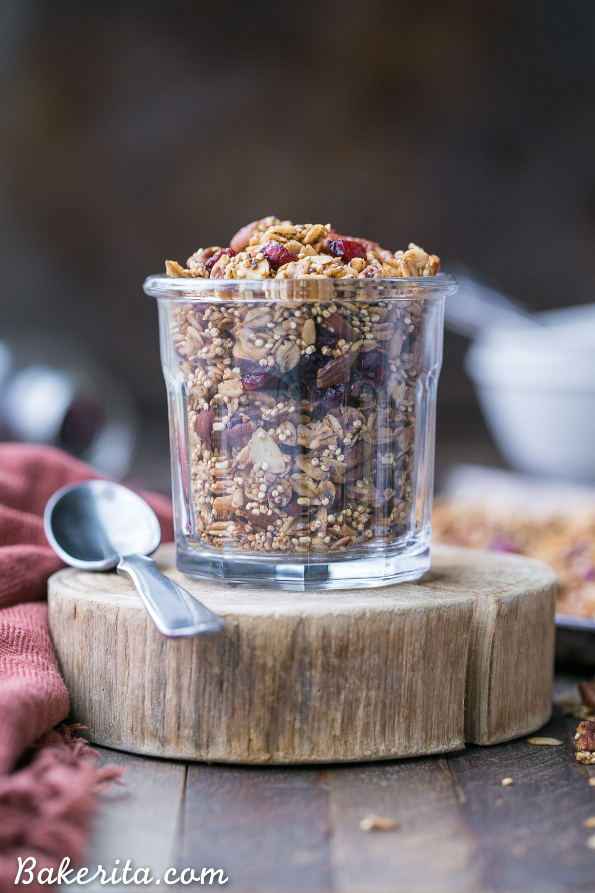This Quinoa Granola is a nutty, crunchy breakfast or snack option that's packed with whole grains and protein. This maple-sweetened granola is gluten-free and vegan, with cinnamon and dried cranberries for flavor! The quinoa bakes up into delicious clusters.