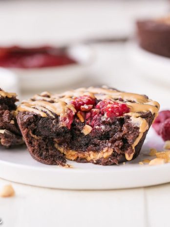 These Gluten Free Peanut Butter & Jelly Brownie Bites are fudgy and flavorful, with a surprise of peanut butter and jelly on the inside of each brownie! If you're a peanut butter & jelly fan, you're going to love these.