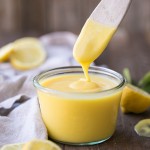 This Paleo Lemon Curd is easy to make, super silky, and perfectly tart. It's a refined sugar free honey-sweetened recipe made with just five ingredients. It's perfect to drizzle on pancakes or waffles, swirl into your yogurt, use it in baked goods, or just eat it with a spoon!
