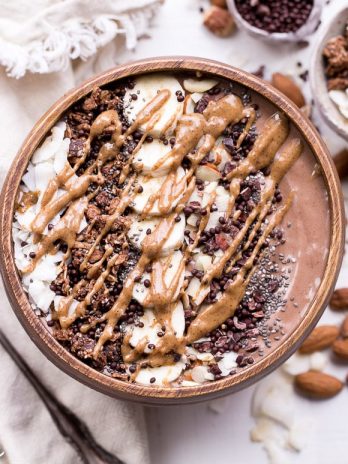 This Almond Chocolate Coconut Smoothie Bowl is refreshing and chocolatey - it's an absolutely delicious way to start the day! This easy recipe is gluten-free, vegan, and comes together in 5 minutes.