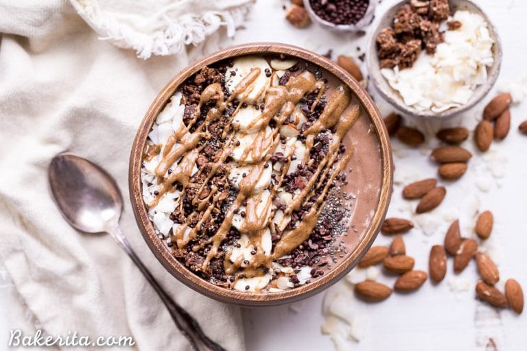 This Almond Chocolate Coconut Smoothie Bowl is refreshing and chocolatey - it's an absolutely delicious way to start the day! This easy recipe is gluten-free, vegan, and comes together in 5 minutes.