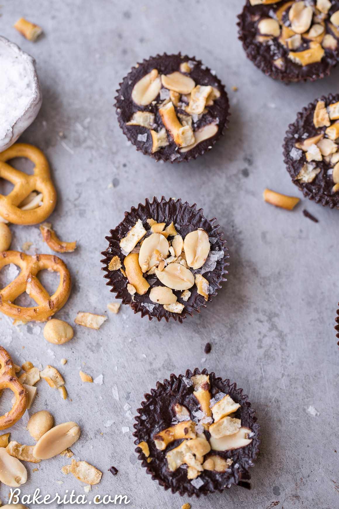 These Chocolate Pretzel Peanut Butter Cups are inspired by the Take 5 candy bar, but made with way more wholesome ingredients! These gluten-free, refined sugar-free and vegan candy cups are filled with peanut butter caramel, with pretzels and peanuts for crunch.