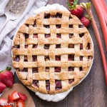 This Paleo Strawberry Rhubarb Pie is bursting with fresh strawberries and rhubarb, creating a delectable tart + sweet pie! The crisp and flaky gluten-free + grain-free crust is the perfect vessel for the lightly spiced fruit filling.