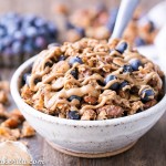 This Blueberry Almond Butter Grain-Free Granola is an easy and satisfying gluten-free, vegan and paleo granola recipe that makes the perfect breakfast or snack. It's made with simple, wholesome ingredients and is loaded with filling nuts and healthy fats to keep you satisfied.