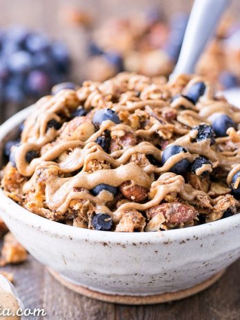 This Blueberry Almond Butter Grain-Free Granola is an easy and satisfying gluten-free, vegan and paleo granola recipe that makes the perfect breakfast or snack. It's made with simple, wholesome ingredients and is loaded with filling nuts and healthy fats to keep you satisfied.