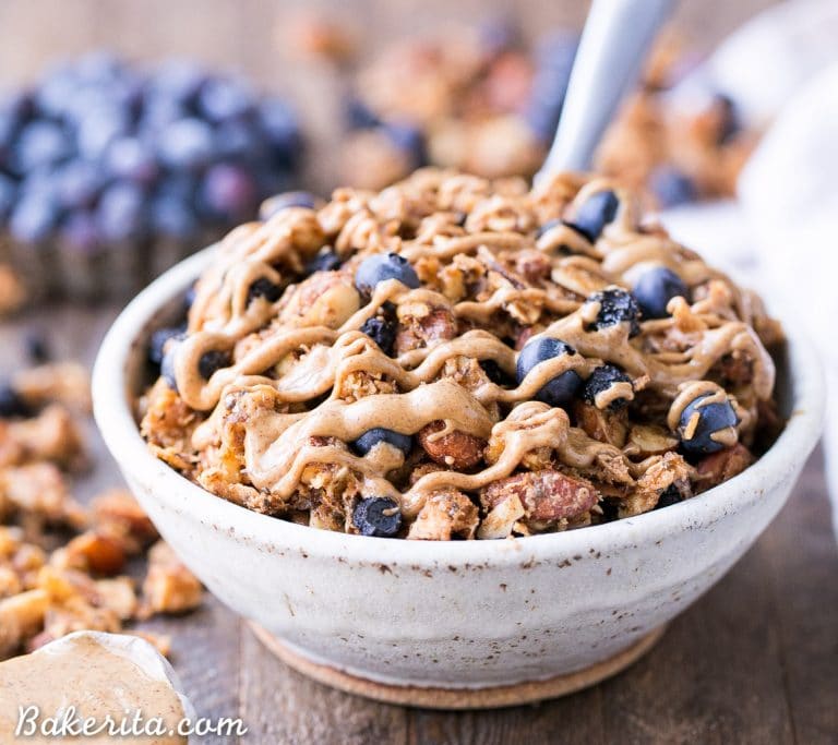 This Blueberry Almond Butter Grain-Free Granola is an easy and satisfying gluten-free, vegan and paleo granola recipe that makes the perfect breakfast or snack. It's made with simple, wholesome ingredients and is loaded with filling nuts and healthy fats to keep you satisfied.