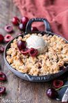 This Cherry Crisp has an irresistible grain-free crumble topping that will have your spoon diving in for more! It's a gluten-free, paleo, and vegan dessert that can be enjoyed all year round.