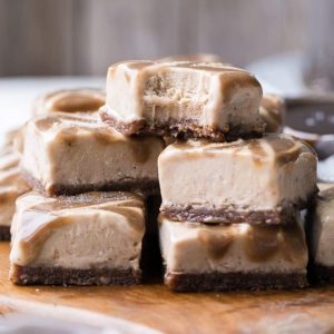 These Frozen Caramel Banana Bars are easy to make in a blender or food processor, and they're super creamy and refreshing. They have a chewy pecan-date crust, topped with banana nice cream and a caramel swirl.