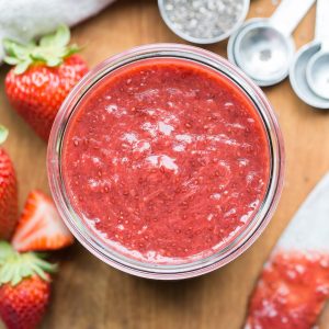 This Strawberry Chia Jam is an easy and delicious way to preserve the summer's freshest, sweetest strawberries! This four ingredient recipe is naturally thickened with chia seeds and sweetened with a touch of maple syrup. You'll love this easy paleo + vegan recipe.