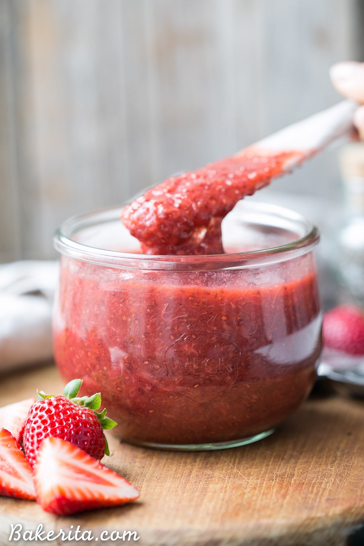 This Strawberry Chia Jam is an easy and delicious way to preserve the summer's freshest, sweetest strawberries! This four ingredient recipe is naturally thickened with chia seeds and sweetened with a touch of maple syrup. You'll love this easy paleo + vegan recipe.