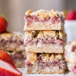 These Strawberry Crumble Bars have an irresistible crust and crumble topping that's full of texture - no oats necessary! These fruity bars are gluten-free, paleo, and vegan.