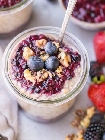 These Superfood Overnight Oats with Easy Berry Chia Jam are the perfect filling breakfast, loaded with superfoods to give your day a kickstart. This gluten-free, refined sugar-free and vegan recipe can be prepped in a just few minutes for a delicious grab-and-go breakfast.