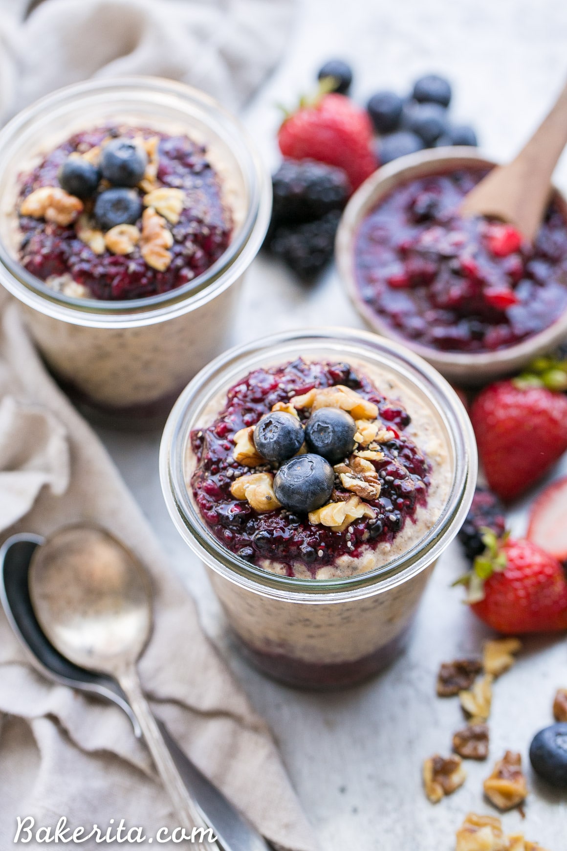 These Superfood Overnight Oats with Easy Berry Chia Jam are the perfect filling breakfast, loaded with superfoods to give your day a kickstart. This gluten-free, refined sugar-free and vegan recipe can be prepped in a just few minutes for a delicious grab-and-go breakfast.