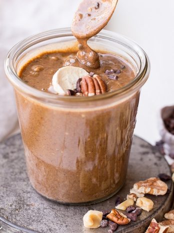 This Banana Nut Butter with Cacao Nibs is a sweet spreadable treat made with pecans and walnuts, and crunchy cacao nibs in every bite! This sugar-free nut butter is paleo, vegan, and Whole30-friendly - you'll want to spread it on everything.