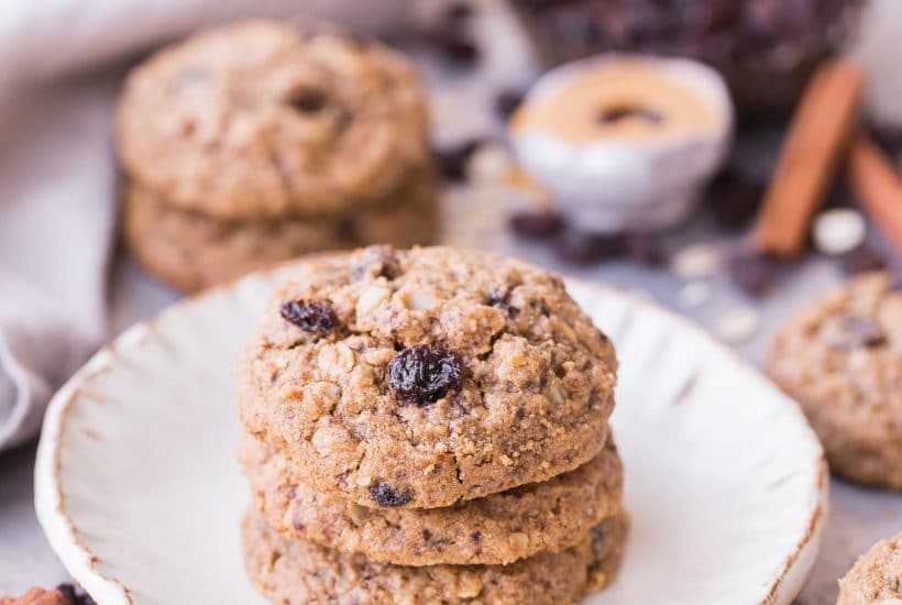 These Peanut Butter Oatmeal Raisin Cookies are the best oatmeal raisin cookies I've ever had! They're incredibly soft and chewy, with crispy edges and MAJOR peanut butter flavor. You won't believe they're gluten-free, refined sugar-free and vegan.