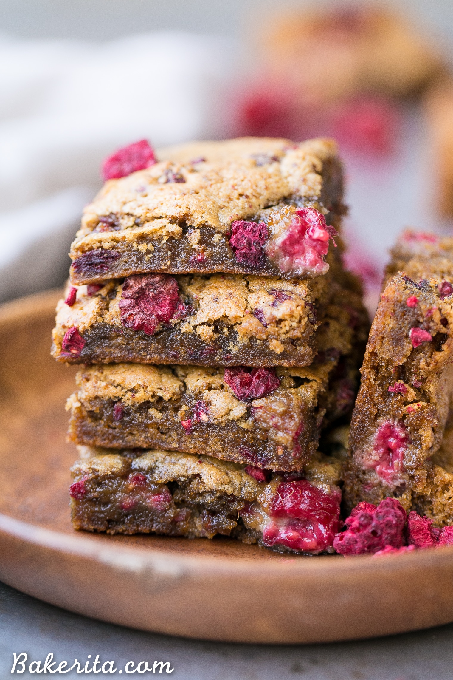 These Raspberry Blondies are incredibly soft and chewy and full of bright berry flavor. These gluten-free, Paleo and vegan blondies are made with cashew butter, coconut flour, and fresh raspberries!