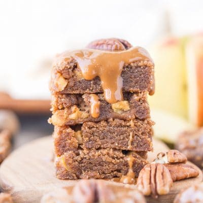 These Apple Blondies are full of warm spices and topped with an absolutely scrumptious (and SUPER easy) caramel glaze. These chewy, soft apple blondies are gluten-free, paleo and vegan.