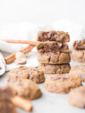 These Soft Chocolate Chip Pumpkin Cookies are a cakey and delicious spiced cookie that’s loaded with chocolate! If you like softer cookies, you’ll adore these gluten-free, paleo + vegan pumpkin cookies.