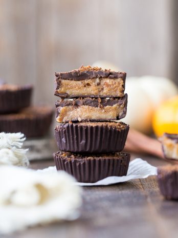 These Chocolate Pumpkin Spice Cups are a gooey, pumpkin spiced twist on the more traditional chocolate cups you know and love. You're going to go nuts for the spiced, caramel-like filling in these gluten free, paleo, and vegan pumpkin spice cups.