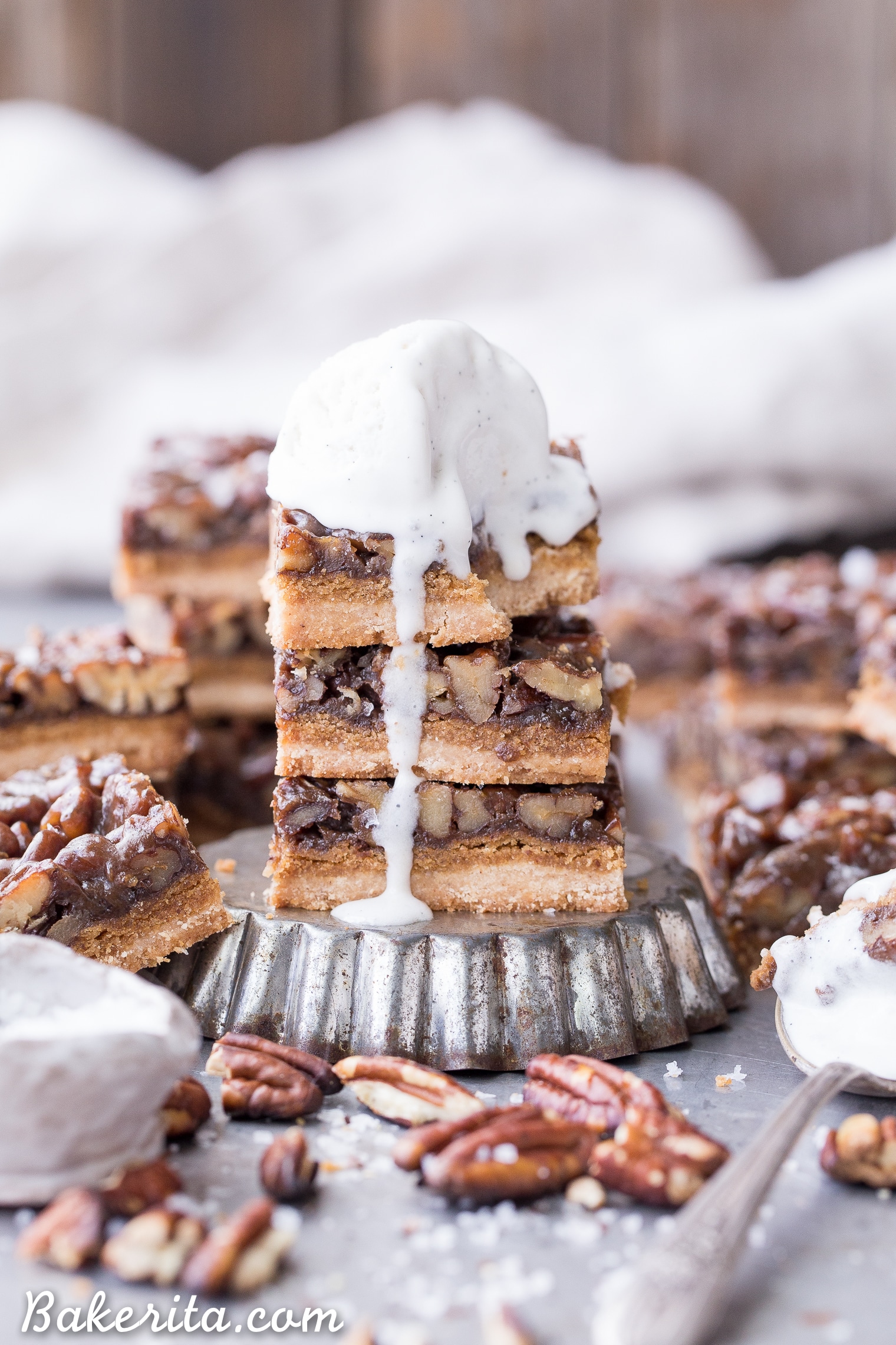 These Pecan Pie Bars are thick and caramelly, with a crispy coconut flour shortbread crust and a gooey pecan pie filling on top. These gluten-free, paleo, and vegan bars will be the star of your dessert spread!