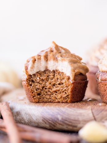 These Pumpkin Chai Cupcakes are soft, moist and bursting with warm chai spices and pumpkin flavor. They're topped with an irresistible cashew-based chai frosting that you'd never guess is paleo + vegan.
