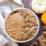 This Pumpkin Pie Smoothie Bowl tastes like a smoothie version of pumpkin pie filling! It's loaded with veggies for a filling, nutrient-dense breakfast that's bursting with fall flavors and spices. It's gluten-free, paleo, vegan and Whole30.