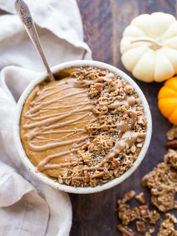 This Pumpkin Pie Smoothie Bowl tastes like a smoothie version of pumpkin pie filling! It's loaded with veggies for a filling, nutrient-dense breakfast that's bursting with fall flavors and spices. It's gluten-free, paleo, vegan and Whole30.