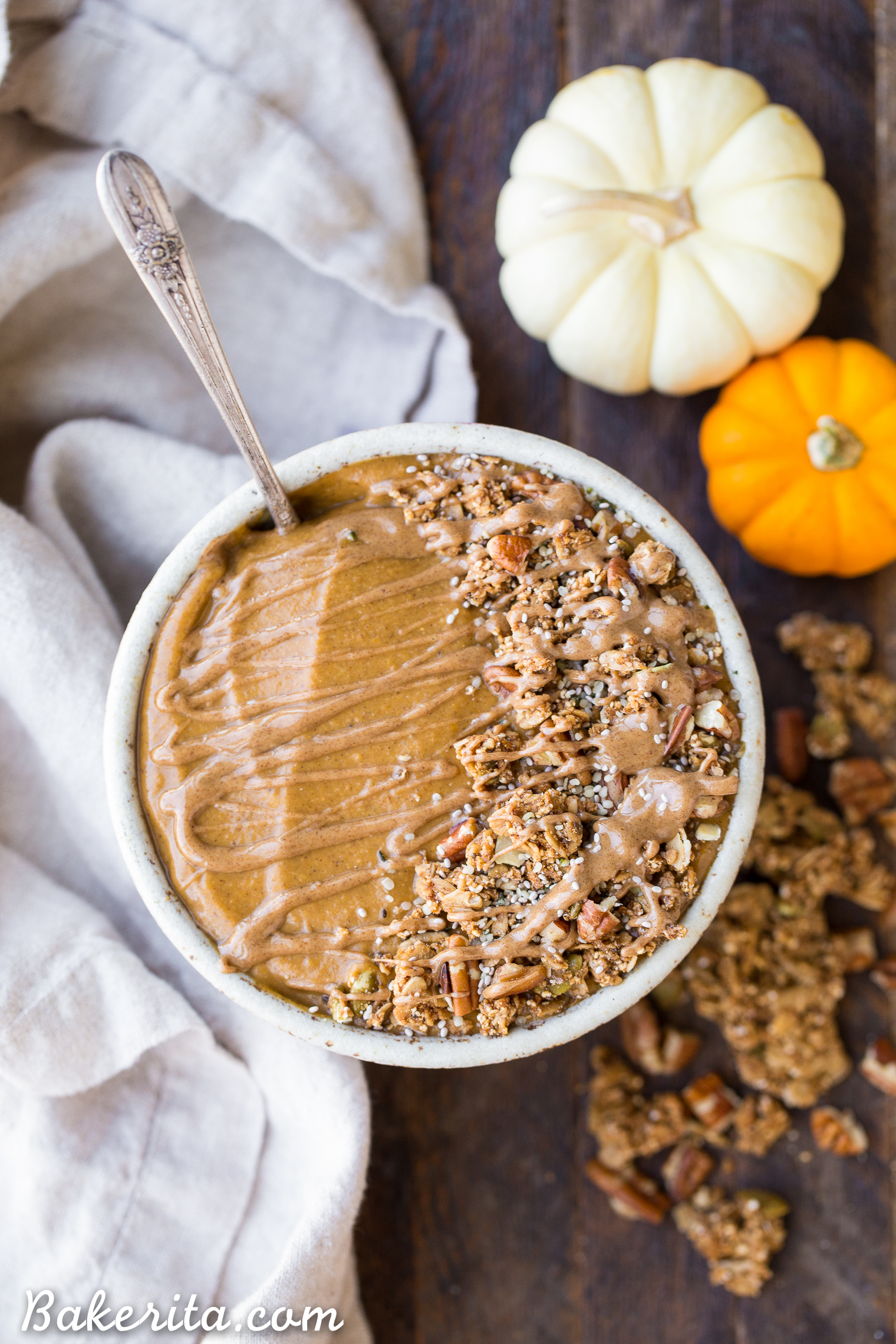 This Pumpkin Pie Smoothie Bowl tastes like a smoothie version of pumpkin pie filling! It's loaded with veggies for a filling, nutrient-dense breakfast that's bursting with fall flavors and spices. It's gluten-free, paleo, vegan and Whole30.