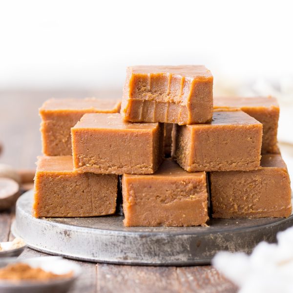 This Pumpkin Spice Fudge is an easy-to-make, no-cooking-necessary treat that melts in your mouth and tastes like fall! With just five ingredients, this homemade fudge couldn't be easier to make.