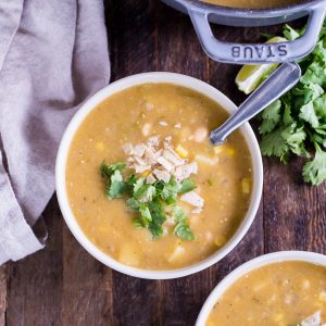 This Vegan White Bean Chili is so hearty and filling, even the carnivores will be asking for more! This creamy chili is gluten-free and dairy-free, and it's loaded with green chiles, potatoes, corn, white beans, and just the right amount of kick.