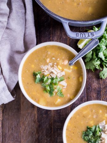 This Vegan White Bean Chili is so hearty and filling, even the carnivores will be asking for more! This creamy chili is gluten-free and dairy-free, and it's loaded with green chiles, potatoes, corn, white beans, and just the right amount of kick.