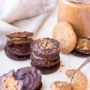 These Chocolate Cookie Butter Cups are filled with a lusciously smooth and creamy homemade cookie butter! I bet you'd never guess that these incredible homemade chocolate candies are gluten-free, paleo, and vegan.