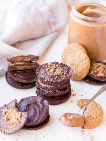 These Chocolate Cookie Butter Cups are filled with a lusciously smooth and creamy homemade cookie butter! I bet you'd never guess that these incredible homemade chocolate candies are gluten-free, paleo, and vegan.
