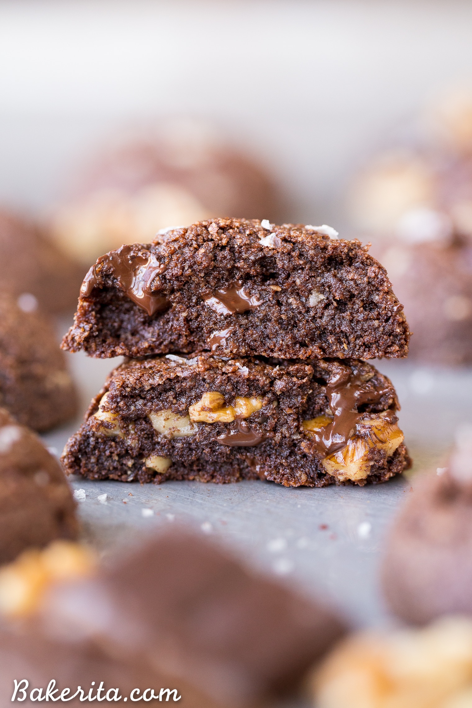 These Dark Chocolate Chunk Cookies are incredibly rich and dark, with melty chocolate chunks and toasted walnuts for crunch. These chewy, fudgy dark chocolate chip cookies are gluten-free, paleo, and vegan, and perfect for the chocolate lover in your life. 