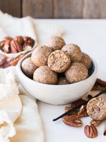 These Pecan Pie Fat Bombs are a super filling nutritional powerhouse, with loads of healthy fats and protein, and no sugar needed! These fat bombs full of vanilla bean and buttery pecans, and they're gluten-free, paleo, vegan, keto, and Whole30-approved.