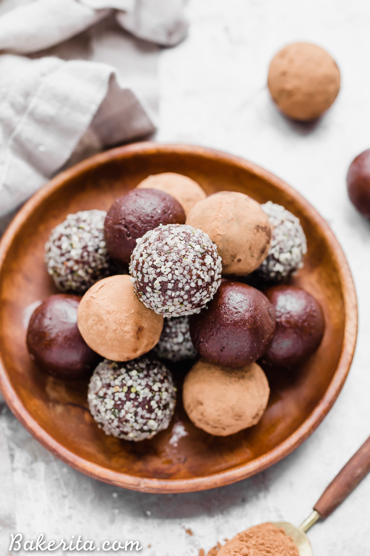 These Raw Chocolate Truffles will satisfy your chocolate candy cravings, guilt-free! These raw, date-sweetened truffles are easy to make in your blender or food processor, and they're gluten-free, paleo, and vegan.