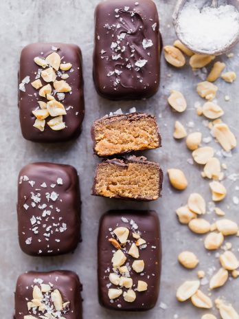 These Dark Chocolate Peanut Butter Truffle Bars are easy to make and SO delicious - these are the perfect healthier candy bar! They're gluten-free and grain-free with a vegan option.