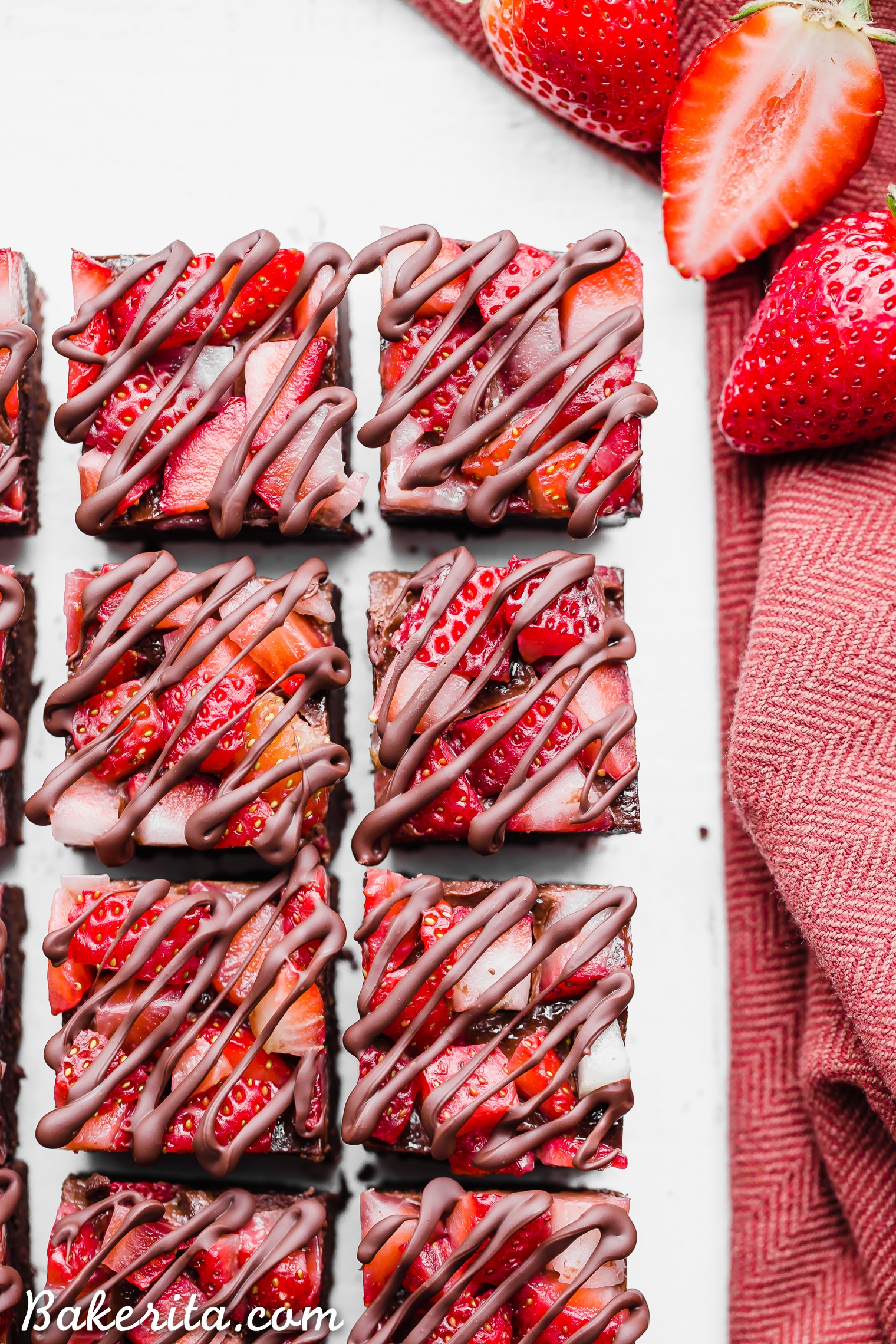 This Chocolate Strawberry Fudge is a simple and delicious five-ingredient recipe you'll want to make over and over! It tastes just like chocolate covered strawberries, but way easier to make. There's no cooking required for this gluten-free, paleo and vegan fudge recipe.