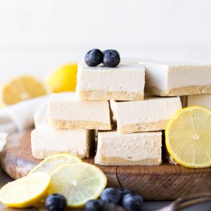 These No Bake Lemon Bars are incredibly smooth and creamy with a bright and tart lemon flavor. These gluten-free, paleo and vegan lemon bars come together quickly and easily in a blender. 