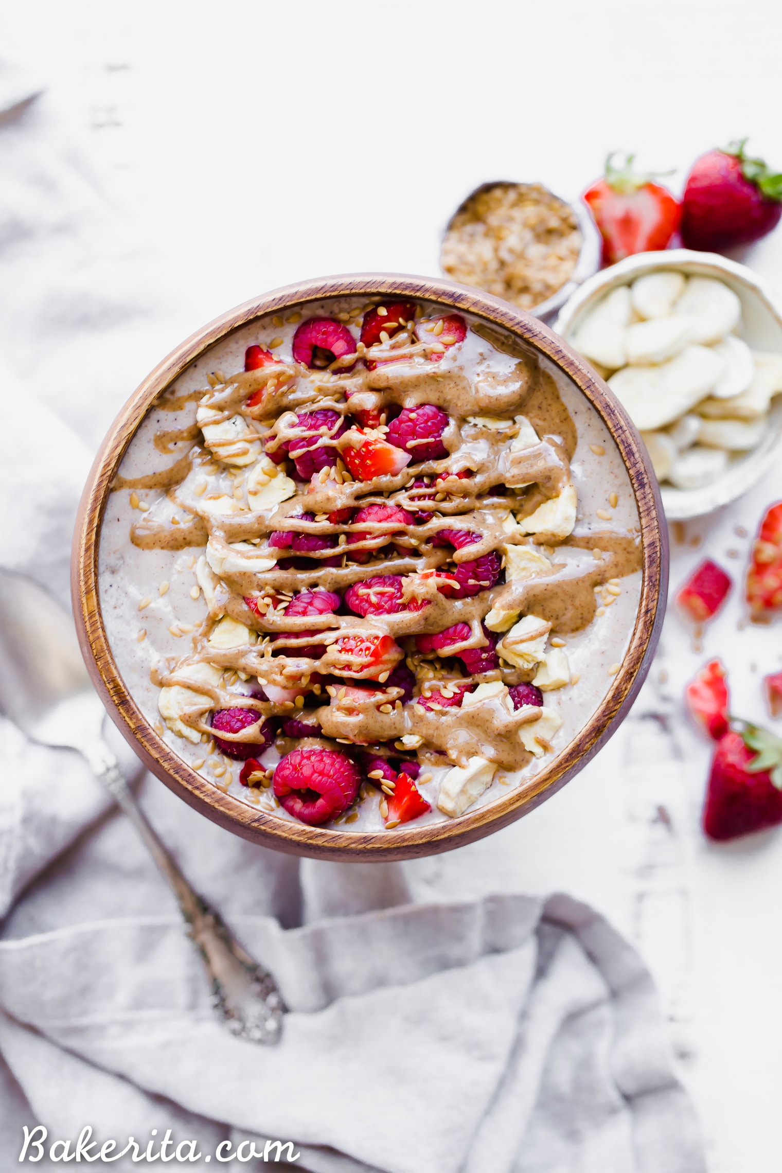 This Banana Date Smoothie Bowl (or smoothie) is a creamy and sweet treat that tastes like ice cream but is simple and healthy enough for breakfast thanks to a secret veggie that's snuck in there. Make yourself a bowl of this paleo and vegan banana date goodness on the next warm morning for a refreshing breakfast.
