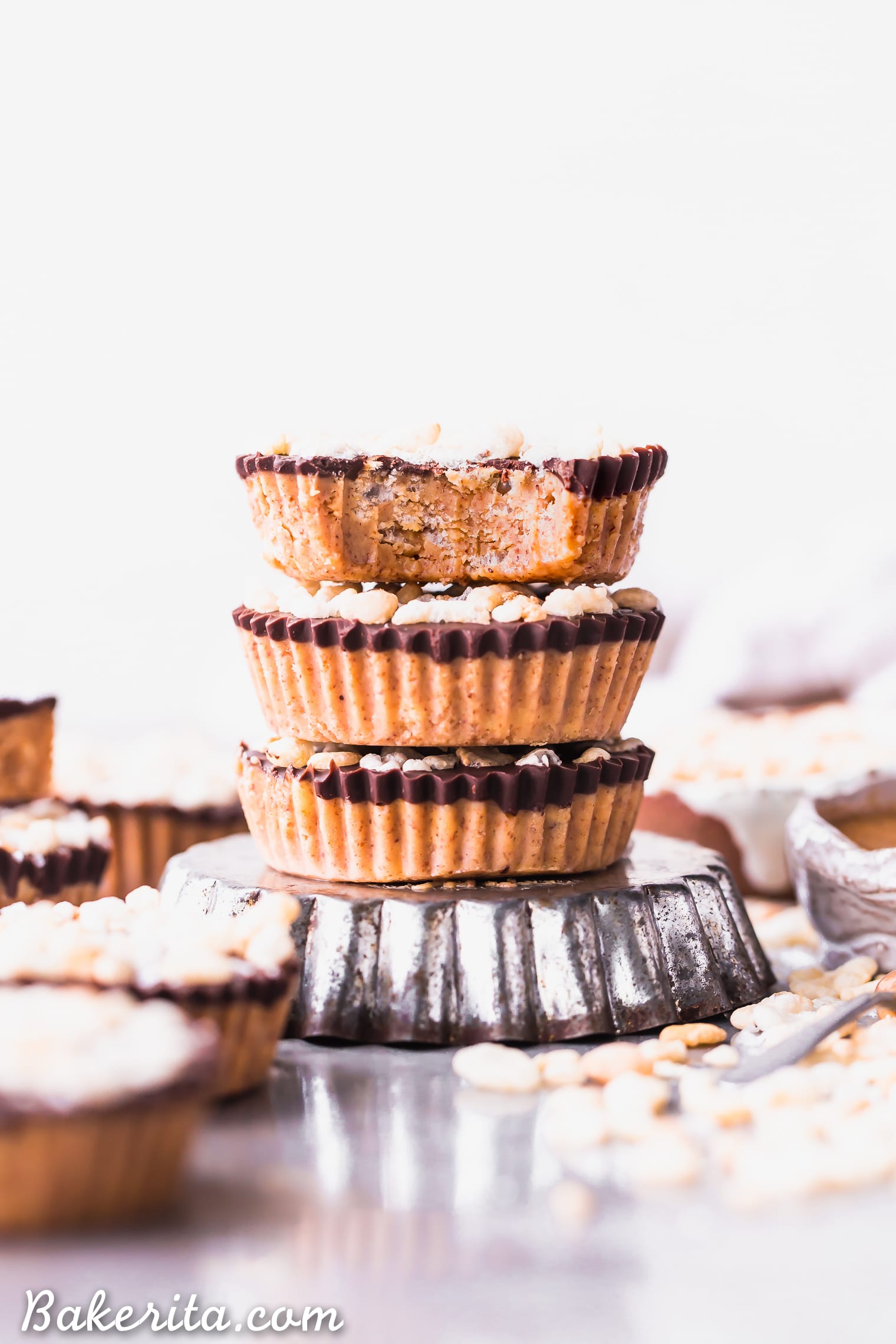 These No-Bake Crispy Chocolate Almond Butter Cups are rich, decadent, and so delicious, with a crispy almond butter layer topped with dark chocolate. The crisp comes from crispy brown rice cereal! You'd never guess these almond butter cups were gluten-free, refined sugar-free, and vegan. 