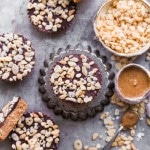 These No-Bake Crispy Chocolate Almond Butter Cups are rich, decadent, and so delicious, with a crispy almond butter layer topped with dark chocolate. The crisp comes from crispy brown rice cereal! You'd never guess these almond butter cups were gluten-free, refined sugar-free, and vegan. 