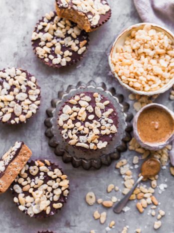 These No-Bake Crispy Chocolate Almond Butter Cups are rich, decadent, and so delicious, with a crispy almond butter layer topped with dark chocolate. The crisp comes from crispy brown rice cereal! You'd never guess these almond butter cups were gluten-free, refined sugar-free, and vegan. 