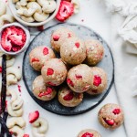 These Strawberry Vanilla Bean Energy Balls are an easy, no-bake snack that tastes like strawberry shortcake! With a base of raw cashews, they're buttery and deliciously flavored with vanilla and strawberries. They're gluten-free, paleo, and vegan, and perfect for bringing on the go.