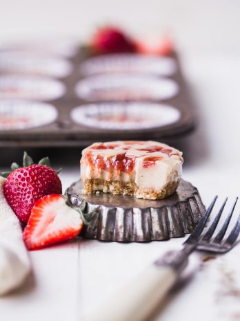 These No Bake Cashew Butter & Jelly Cheesecakes are sweet individual desserts that are lusciously creamy, simple to make, and swirled with strawberry jam. You can customize them with your favorite nut butter and jelly to make them your own! They're gluten-free, paleo and vegan.