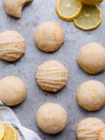 These Lemon Macaroons are bright with lemon flavor, with a touch of maple sweetness and a deliciously chewy texture. The tart lemon glaze is made with coconut butter. You're going to love these irresistibly scrumptious gluten-free, paleo, and vegan macaroons.