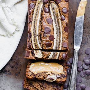 This Chocolate Chip Vegan Banana Bread is so easy to make in just one bowl and it's absolutely delicious! This vegan banana bread is also gluten-free and refined sugar-free - it makes the perfect easy breakfast, snack, or dessert.